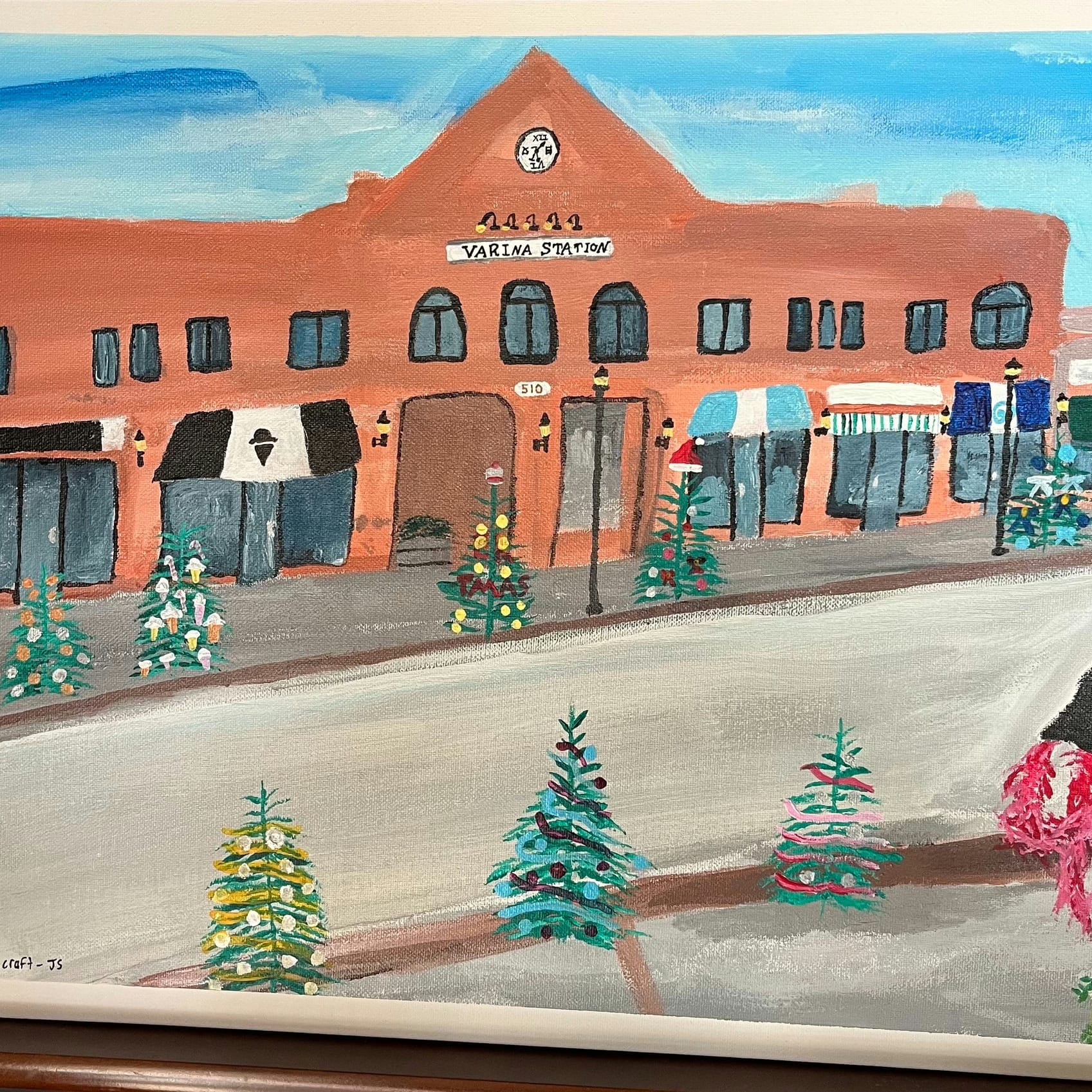 Finished acrylic painting of Varina Station, a row of brick storefronts on Broad Street in Downtown Fuquay-Varina, decorated with painted Christmas trees along the sidewalk.